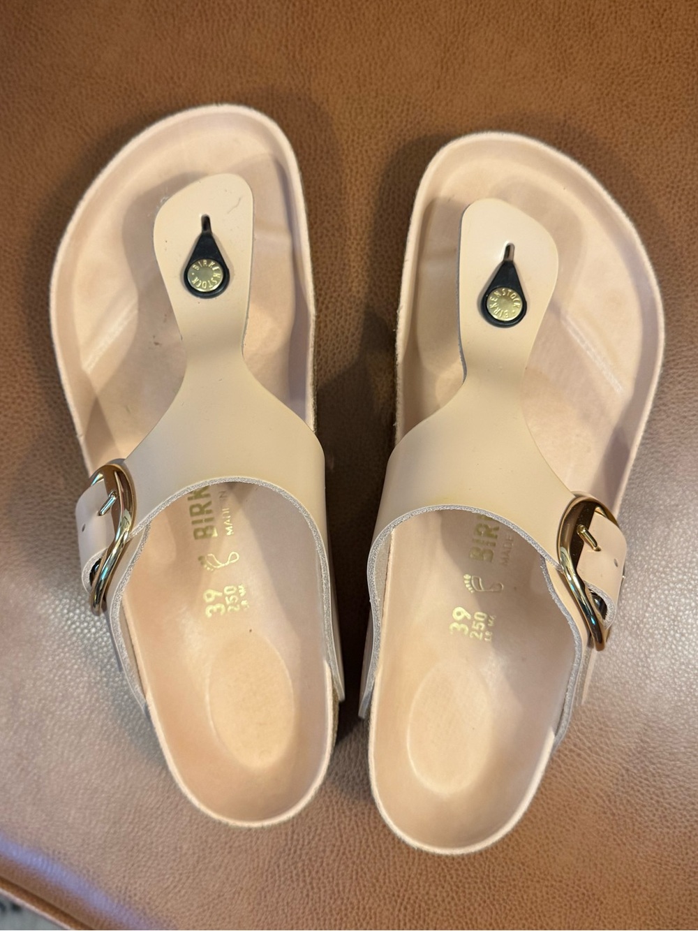 Birkenstock Beige Thong Sandals with Gold Buckle